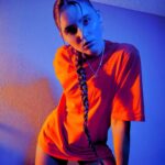 Savannah Clarke Instagram – I N T O 
T H E 
B L U E 
___________________________________

To shine your brightest light
Is to be who you truely are. 

____________________________________
#IntoTheBlue #BlueLight #Portrait_Visions #TakenByMe #PlayingWithLight #Contrast #UltraVioletLight #Orange #TshirtDress #LongBoots #KeepShining #ShineBright
___________________________________
_____________________________________ Sydney