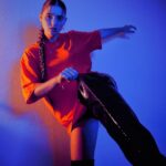 Savannah Clarke Instagram - I N T O T H E B L U E ___________________________________ To shine your brightest light Is to be who you truely are. ____________________________________ #IntoTheBlue #BlueLight #Portrait_Visions #TakenByMe #PlayingWithLight #Contrast #UltraVioletLight #Orange #TshirtDress #LongBoots #KeepShining #ShineBright ___________________________________ _____________________________________ Sydney