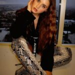Savannah Clarke Instagram - C A R P D I E M _________________________________ Seize the day : To put aside all differences , all fears , all worries , and just go for it. _______________________________________ #CarpDiem #SiezeTheDay #QuotesToLiveBy #OversizedJackets #SnakePrint #ThighHighBoots #SignatureLook #DayAtWork #PerformanceDay #CrimpedHair #Belt #BootsLover #EveningsWithAView #JustGoForIt _____________________________________ West Hollywood CA
