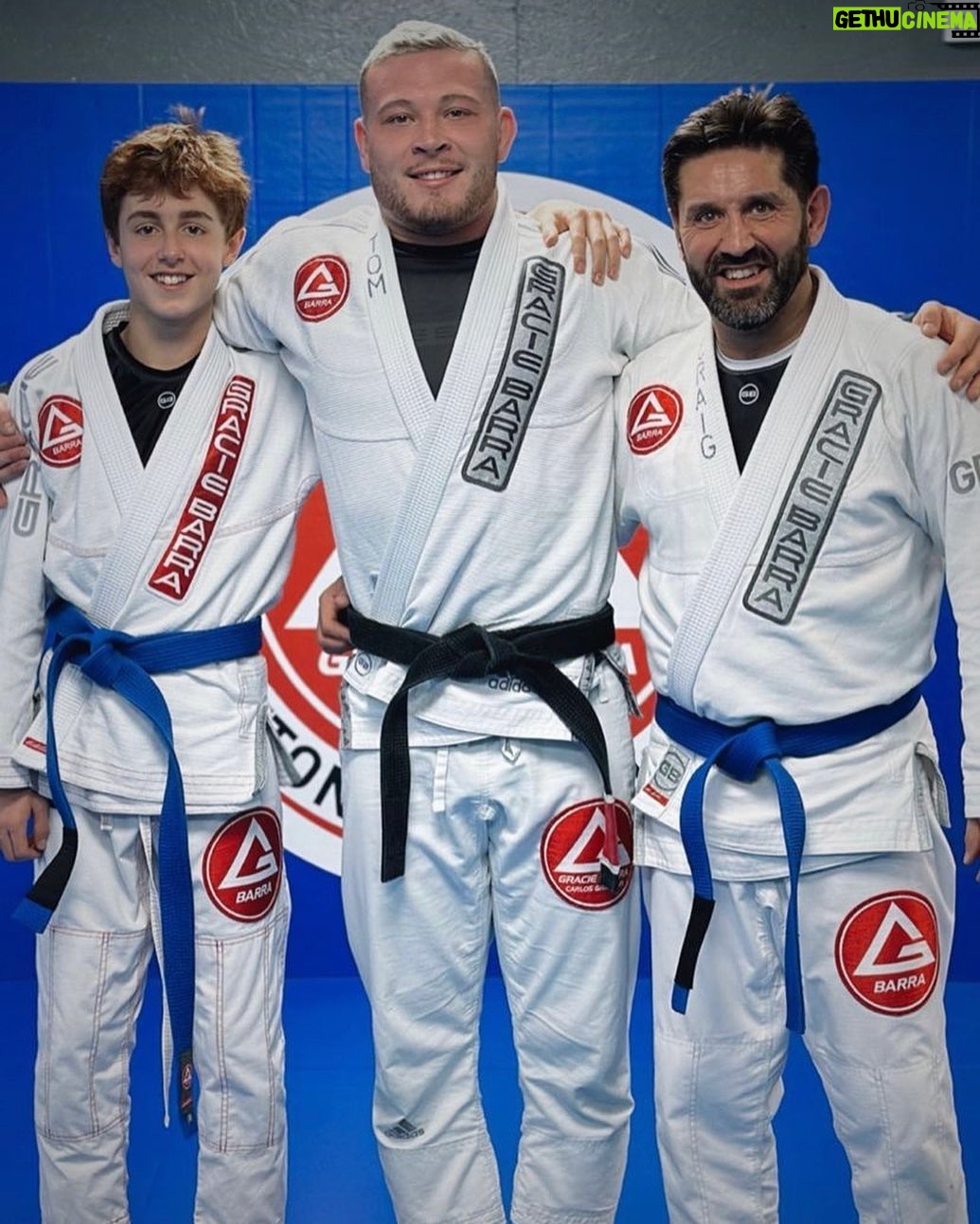 Scott Adkins Instagram - Today my brother & nephew were awarded joint father & son Brazilian Jiu Jitsu blue belts by Sensei @tombjj at @graciebarrasuttoncoldfield - congratulations @craigjadkins & Charlie!! Awesome job!! #jiujitsu