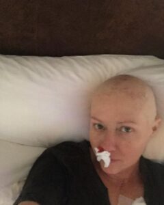 Shannen Doherty Instagram - For breast cancer awareness month, I’d like to share more of my own personal journey from my first diagnosis to my second. Is it all pretty? NO but it’s truthful and my hope in sharing is that we all become more educated, more familiar with what cancer looks like. I hope I encourage people to get mammograms, to get regular checkups, to cut thru the fear and face whatever might be in front of you. In 2015 I got diagnosed with breast cancer. I had a mastectomy and did chemo and radiation. I had many nose bleeds from the chemo. Not sure if any of you experienced this. I also was beyond tired. I cheered myself up by putting on funny pajamas that my friend Kristy gave me. Did they actually cheer me up? Yes!! Lol. I looked ridiculous and in that ridiculousness, I was able to laugh at myself. Finding humor helped get me thru what seemed impossible. I hope we all find humor in the impossible. #breastcancerawareness