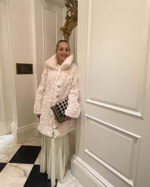 Sharon Stone Instagram - 🤍 This Coat! Love you @couture.to.the.max!

Creative Director/ Stylist: @theparislibby for @aframe_agency 
Coat: @couture.to.the.max 
Dress: @eliesaabworld
Bag: @fendi
Jewelry: @emmanuel_tarpin