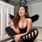 Shobhita Rana Instagram - I'm 99% angel, but oh, that 1%… ;)👼🎃🖤 #halloween #spookyseason #halloweencostume #happyhalloween Dubai, United Arab Emirates