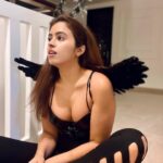 Shobhita Rana Instagram - I'm 99% angel, but oh, that 1%… ;)👼🎃🖤 #halloween #spookyseason #halloweencostume #happyhalloween Dubai, United Arab Emirates