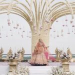 Shrenu Parikh Instagram - “ With each step towards the first look, the bride and groom left behind the remnants of the morning, stepping into the purity of the present moment. The photograph captured not just their attire but the transformation, a metamorphosis into a union bound by love.“✨🤍 Bride : @shrenuparikhofficial Groom : @akshaymhatre11 Outfit: @bridesofkalki @runit_gupta MUA: @nehaadhvikmahajan Hair stylist: @timemachinebrides Jewellery: @raabtabyrahul Event planner: @thetuliptouch Location: @lilleria.riverside Shot on EOS R3, R6 mark ii @canonindiaofficial 24mm ,35mm, 50mm, 85mm 📸: @oragrapher @the_travel_filmer_ @_parth.y @jigaaa_a . . . #orabride #oragraphy #weddingphotography #weddingseason #weddingdress #sherwani #bride #indianwedding #indianculture #tradition #destinationwedding #weddingdecor #ethnic #bridewear #vibewithcanon #canwithcanon #capturedoncanon #eosinfluencer #dogreatwithcanon Vadodara, Gujarat, India