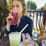 Taissa Farmiga Instagram - Despite how this looks, I am not drinking the blood of a leprechaun 🌈💰