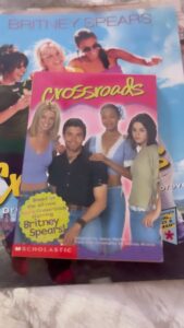 Taryn Manning Instagram - #crossroads the movie #memorbilia #britney #2003 #mimi #memories I love that I am eating a bean and cheese burrito on the one sheet LOL. My fav 🇲🇽 All up for auction soon. A celebration of the re-release ❤️
