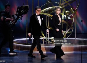 Taylor Tomlinson Instagram - Baby’s first Emmys!
Styled by @taraswennen 
Makeup by @amberdmakeup 
Hair by @kikihaircutter 
Nails @chuenails 

Jumpsuit - @reemacra 
Shoes - @jimmychoo 
Ring- @swarovski 
Earrings- @jaredthegalleriaofjewelry
@gettyimages @gettyentertainment