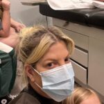 Tori Spelling Instagram - Let’s talk about MOLD… - Here we are again at Urgent Care. We’ve all been on this continual spiral of sickness for months. Sick. Get better. To get sick again. Used to think… well that’s what happens when you have young kids in school. They just continually bring sicknesses home. But, when it gets to the point where they are at home sick more than being in school we had to reassess what was going on. Kids will be kids but when you have your youngest (10 and 6) so sick they are sleeping all day and say they feel dizzy even standing I knew something bigger was going on. Enter Mold inspection! Thx to Sean at Pacific Scope Inspections who came out and discovered extreme mold in our home 😱. The pieces all started to fall into place. Has anyone ever been thru Mold Infections? You just keep getting sick, one infection after another. Respiratory infections. Extreme allergy like symptoms too and like my poor Finn skin rashes as well. As we sit here today in Urgent Care … watching everyone getting swabbed and first up Finn with Strep throat ✅and high fever of 103. We now know that when the house was labeled a health hazard and not live able that wording was FACT. We now GET IT! It’s hard to just uproot a huge family especially in midst of all feeling so sick and in bed. But, we now will vacate the home asap. Looking for an @airbnb or @vrbo or hotel till we can even grasp what to do. We are just renters so looks like moving is in our eminent future as well. Grateful we have renters insurance. We’d be lost how to tackle this without. And, special non shout out to our public school district for repeatedly not believing our kids were as sick as they’ve been continually. Just get them in school right 😡? Has anyone been thru Mold sickness? The deeper dive I do online sadly I see how common this is 😢 #mold #moldinfection 🧿 Urgent Care Center