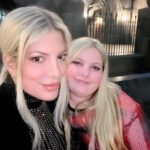 Tori Spelling Instagram - What an incredible evening attending the #standupforkidsgala supporting @luskinoic and the amazing work they do! No kid and no family are ever turned away! No matter if uninsured. They are the best for pediatric orthopedic treatments! Such kind humans doing phenomenal work daily! Loved showing our kids what it’s like to give back. Met the founders, the surgeons, the families and patients they’ve helped, unbelievable! And, @piatoscano duet with patient and ambassador not to mention talented actress and singer @scarlettkateferguson was incredible. Showing she doesn’t let cerebral palsy stop her from achieving her goals and dreams! My friend @carolinerhea4real hosted this amazing evening. I love that my kids now want to volunteer with #luskinoic ❤️🙏🏻. The beautiful night ended with a private show at #harrypotterworld @unistudios . #standupforkids . 📸: @stefaniekeenan @shaesavin Universal Studios Hollywood