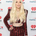 Tori Spelling Instagram - Jingle Ball 2023 … - Music , Kiddos, and Sequins OH MY! My kids and friends and family had the BEST time this past weekend! Thank you for everything @iheartradio @iheartjingleball you made a pre teen girl , teen girl , and moms dream come true seeing @oliviarodrigo . After a challenging 2023 it was everything to see Olivia! She’s been our anthem and music champion thru this time. We sang our hearts out to her. Grateful beyond words to my @iheartradio family!! Also grateful to our friends and hair/makeup goddesses that made all of us girlies look and feel special : @laurarugetti @julzhopemua @nicolevegahair ❤️. - 🙋🏼‍♀️ look: dress/ @_zhivago_ necklace/ @dylanlex hair/ @laurarugetti @hiddencrownhair . - Stella look/ MU @stella_mcdermott08 hair/ @laurarugetti using @laurarugetti x @hiddencrownhair clip ins color Malibu . Hattie/ MUA @julzhopemua hair/ @nicolevegahair . - Finn/ @urbanoutfitters . - Beau/ @calakids_boutique . - Photo Credit: Jesse Grant/ Getty Images for iHeartRadio @jgrantphoto Backstage photos: Carly Sharp ¡HeartRadio @carlyjeansharp . - Photo: @bentrivett @people @entertainmentweekly Kia Forum