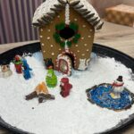 Veronica Merrell-Burriss Instagram - One of our favorite holiday traditions is making gingerbread houses!🎄 How do you think we did this year?! 🥰🧣☃️