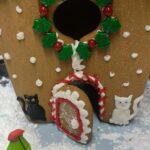 Veronica Merrell-Burriss Instagram - One of our favorite holiday traditions is making gingerbread houses!🎄 How do you think we did this year?! 🥰🧣☃️