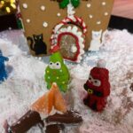 Veronica Merrell-Burriss Instagram - One of our favorite holiday traditions is making gingerbread houses!🎄 How do you think we did this year?! 🥰🧣☃️