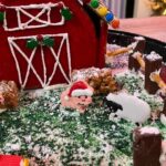 Veronica Merrell-Burriss Instagram - One of our favorite holiday traditions is making gingerbread houses!🎄 How do you think we did this year?! 🥰🧣☃️