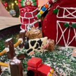 Veronica Merrell-Burriss Instagram - One of our favorite holiday traditions is making gingerbread houses!🎄 How do you think we did this year?! 🥰🧣☃️
