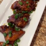 Veronica Merrell-Burriss Instagram - Dinner is served 🍽️♥️ Loved learning to cook Filipino food with @mamawassabi in our newest RonRon video 🇵🇭
