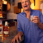 Woody Harrelson Instagram - Here’s to sipping on something outside the status quo. Drink Responsibly! To purchase go to @origenholisticspirits Track - Backwoods BBQ @chrishaugenmusic #drinkholistic #drinkbetter