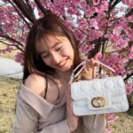 Yuko Araki Instagram - 👜🌸♡💕💓 bag : @dior tops : @rokhofficial bottom : @johnlawrencesullivan_official ring : @dior necklace : @enasoluna_official #fashion #ootd #bag #dior #sakura 🌸　 #diorjoaillerie #supportedbydior ♡