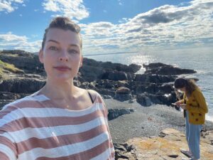 Milla Jovovich Instagram - What an insanely magical experience we had staying in the gorgeous town of Bonavista #newfoundland! Our cabin was literally heaven. Every morning I would wake up an hour before my daughter @everanderson just to sit on the porch and stare at the sea, drink my tea and do a crossword. After Ever finished work on her new movie #peterpanandwendy in the evening, we would go for walks, climbing the rocky cliffs leading down to the ocean. I loved watching her jumping from rock to rock, scrambling around like a little gazelle. At this time of year the weather has been incredible, the wind is fierce but warm, both exhilarating and relaxing. It’s really been unforgettable getting to know this gorgeous, rugged bit of paradise. Thank you to all the wonderful people of this community for welcoming us with open arms!✨