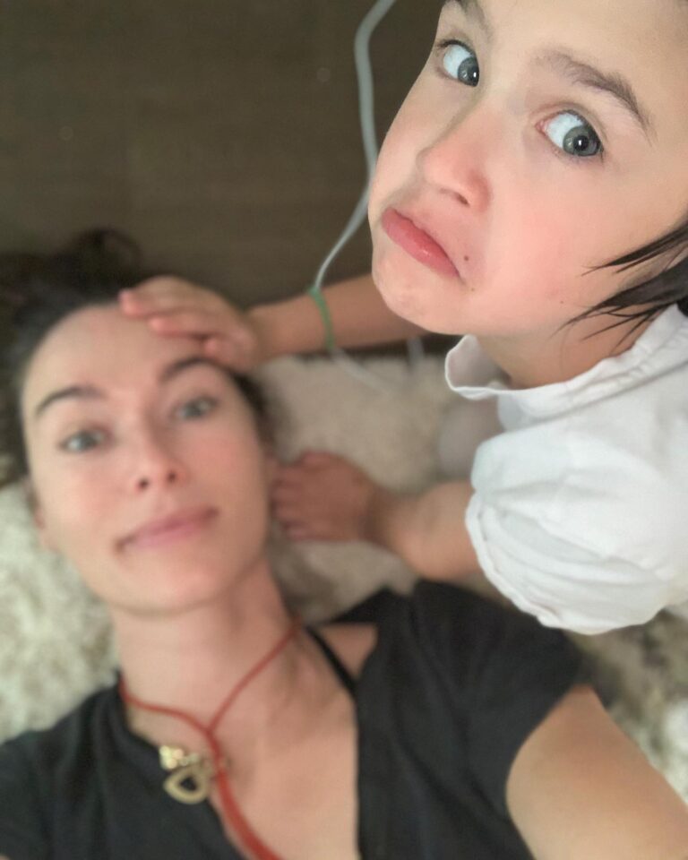 Lena Headey Instagram - She was giving me a massage .. She loves to do that .. She also loves witnessing you bang your head or trap a finger .. It makes her laugh . .. like … . Well like a proper nutter ..
Stubborn and tenacious, opinionated and funny, kind and curious, intuitive and observant .. Ted  LOVES  her people ferociously. 
May you always run with wolves and howl at the moon and cast whatever spells you desire .. 
though we battle DAILY (because you know everything and you’re always right) I love you beyond words, you glorious tiny woman you 👊❤️👊 #internationaldaughtersday