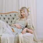 Aurora Aksnes Instagram - Hello beloved ones, I am currently in oslo, exploring small kittens, and shiny fabrics, and also small bottles of potion. and while im doing this, if you want to, you could create/make something magical around ‘the gods we can touch’ 🩸i will share my favourites, even though of course you will all be my favourites. But I will share a few of them. Whoosh whoosh! Ps. Don’t forget to add #thegodswecantouch so I can find your beautiful art 🔮 photo by @_xinli_