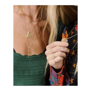 Olivia Wilde Instagram - Never taking this @consciousco charm off. It’s really special to me because I designed it with my best friend and @starling and it’s one of the first pieces ever made with certified post-consumer recycled materials. Sustainability can be chic.