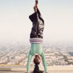 Amanda Gorman Instagram - This year has turned my life upside down—but when everything is inverted and reversed, that means even looking down becomes looking up. ⬇️⬆️
Here’s some of my fav unposted photos from interviews this year (fun fact I can walk on my hands, but post holidays I’m so sleepy whether I’m even walking on my feet is TBD 😂)