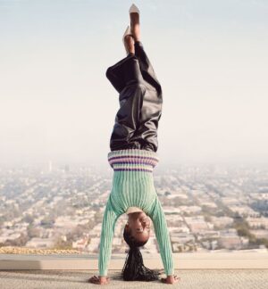 Amanda Gorman Instagram - This year has turned my life upside down—but when everything is inverted and reversed, that means even looking down becomes looking up. ⬇️⬆️
Here’s some of my fav unposted photos from interviews this year (fun fact I can walk on my hands, but post holidays I’m so sleepy whether I’m even walking on my feet is TBD 😂)
