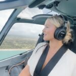 Kinsey Wolanski Instagram – Nothing like flying the heli in sandals to grab lunch 🥗 #islandlife