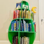 Camilla Luddington Instagram - Hiatus organizing #1. Organizing Hayden’s bookshelf. Went to tell matt how cute the avocado looks! He told me it’s a pear. 🤣🤷‍♀️ 🤦‍♀️