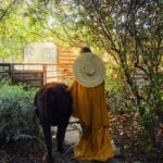 Nikki Reed Instagram - Incredibly honored to be on the cover of @santabarbaramag this month, and so very excited to have the issue center around off-grid-living and sustainability. My idea for this shoot was to merge the two worlds that already represent my daily life; the life of a businesswoman and the life of a farm lover. I wanted to use only pre-owned repurposed fashion from my very own closet, without pulling a single new piece and we did it! Thank you @jennifersmith_c for believing in my company and asking me to be your cover girl, and @samidrasin for capturing my truest self. @santabarbaramag I am so grateful for the opportunity to share a little bit of Bayou and a whole lot of animal love with your readers. And the biggest thank you to Sweet Hillock Farm for allowing Sami to take these images in your beautiful space. The magic you create on that farm is unparalleled. For anyone who wants more, I’ll be taking over SB mag’s IG this weekend so come join me there!🌻

@tweegasb 
@thisiskelseym