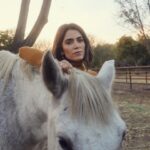 Nikki Reed Instagram - Incredibly honored to be on the cover of @santabarbaramag this month, and so very excited to have the issue center around off-grid-living and sustainability. My idea for this shoot was to merge the two worlds that already represent my daily life; the life of a businesswoman and the life of a farm lover. I wanted to use only pre-owned repurposed fashion from my very own closet, without pulling a single new piece and we did it! Thank you @jennifersmith_c for believing in my company and asking me to be your cover girl, and @samidrasin for capturing my truest self. @santabarbaramag I am so grateful for the opportunity to share a little bit of Bayou and a whole lot of animal love with your readers. And the biggest thank you to Sweet Hillock Farm for allowing Sami to take these images in your beautiful space. The magic you create on that farm is unparalleled. For anyone who wants more, I’ll be taking over SB mag’s IG this weekend so come join me there!🌻

@tweegasb 
@thisiskelseym