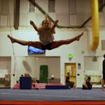 Kinsey Wolanski Instagram - Quick stop at a gymnastics gym! haven’t been a gymnast since I was a young kid but it’s crazy your body can remember so much but I’m definitely going to be sore.