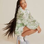 Priah Ferguson Instagram - I’m so excited to share my special feature with @POPSUGAR! We talked about Erica’s future on Stranger Things, my upcoming movie with the one and only Marlon Wayans, and how I spend my time off set. (I’m a cheerleader and I love to meditate.) Check it out! This was incredible and thanks for capturing my vibe and essence with authenticity. To my team, ily. Link in bio.🫶🏽

Written by: @jackie_jormpjomp 
Photography: @tawnibannister 
Stylist: @sophielopez
Braids by: @hairbyromorgan 
Braid styling: @milesjeffrieshair 
Makeup: @brandyallen