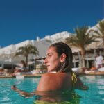 Amina Khalil Instagram – Summers from my favorite island in the world 🌴🐠🧿 @cavotagoomykonos #mykonos. 
📸 @visualsofzeina