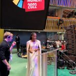 Amanda Gorman Instagram - Still in awe that I had the honor of speaking beside these lovely ladies @unitednations #GeneralAssembly this week as a supporter of @unicef . By supporting the Sustainable Development Goals, we share a universal call to action to end poverty, protect the planet, and pursue peace. I can’t tell you how many times I’ve been told a single poem can’t change the world. What I know is that if you look closely enough, the world IS changing—there are movements and actions waiting for our involvement, spearheaded by future generations. And I can’t imagine anything more worthy of naming, celebrating, writing, believing, and joining. 💛🙏🏿🇺🇳🌍

EXCERPT FROM “AN ODE WE OWE: A POEM FOR HUMANKIND” 
 
We must go the distance,
Though this battle is hard and huge,
Though this fight we did not choose,
For preserving the earth isn’t a battle too large
To win, but a blessing too large to lose.

This is the most pressing truth: 
That our people have only one planet to call home
And our planet has only one people to call its own.

We can either divide and be conquered by the few,
Or we can decide to conquer the future, 
	And say that today a new dawn we wrote, 
	Say that as long as we have humanity,
We will forever have hope.