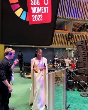 Amanda Gorman Instagram - Still in awe that I had the honor of speaking beside these lovely ladies @unitednations #GeneralAssembly this week as a supporter of @unicef . By supporting the Sustainable Development Goals, we share a universal call to action to end poverty, protect the planet, and pursue peace. I can’t tell you how many times I’ve been told a single poem can’t change the world. What I know is that if you look closely enough, the world IS changing—there are movements and actions waiting for our involvement, spearheaded by future generations. And I can’t imagine anything more worthy of naming, celebrating, writing, believing, and joining. 💛🙏🏿🇺🇳🌍

EXCERPT FROM “AN ODE WE OWE: A POEM FOR HUMANKIND” 
 
We must go the distance,
Though this battle is hard and huge,
Though this fight we did not choose,
For preserving the earth isn’t a battle too large
To win, but a blessing too large to lose.

This is the most pressing truth: 
That our people have only one planet to call home
And our planet has only one people to call its own.

We can either divide and be conquered by the few,
Or we can decide to conquer the future, 
	And say that today a new dawn we wrote, 
	Say that as long as we have humanity,
We will forever have hope.