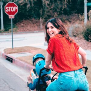 Caterina Scorsone Instagram - Have you been to Holland? One of the rad things about Holland is watching everyone whip around on bikes along the canals. The parents have bicycles with cargo cabs for the kids. Everybody gets to ride. 
October is here, which means it is Down Syndrome Awareness month! Last month @bunchbikes launched the Family Superhero program in an effort to make their awesome bikes more accessible, physically and financially, to more people. 
This bike is roomy, safe, and easy to ride. (And it doesn’t hurt to get a little electric boost when transporting a band of tiny humans around.) My littles and I love our Bunch Bike and we hope you will too! 

Beware! Do not let your toddler bring a random garden gnome with them on the ride. They WILL throw it over the side and the gnome will meet a gruesome demise. RIP Gnome. (It should also be noted that i ALWAYS wear a helmet…except when taking a photograph for an Instagram post.;)

Link in bio for more info about the Bunch Bike Family Superhero Program 🚲 📸 @msage.jpg