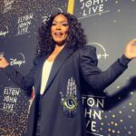 Angela Bassett Instagram - Hey Everybody you good? Topping off a fab weekend with the concert of a lifetime: celebrating THE icon @eltonjohn ! @courtneybvance are gonna dance right down memory lane! @disneyplus @nicolaparish #eltonfarewelltour #eltonlive