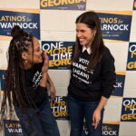 Tessa Thompson Instagram - We’re just two professional actresses who’ve forgotten how to pose naturally standing in front of Georgia asking her to vote now for @raphaelwarnock 

Early voting ends Dec 2nd. Election Day is Tuesday Dec 6th. #voteearly #georgiarunoff