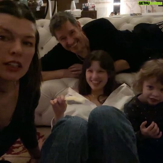 Milla Jovovich Instagram - Happy New Year from the Andersons! This post goes back in time of our epic New Year’s Day. It starts with a hard won family photo where almost everyone is in focus. Before that I made dinner in our hotel using a one burner hot plate (half the food was pretty lukewarm but still delicious). I made my mom’s famous fried potatoes which is always a hit with the kids, but also some gorgeous asparagus and trumpet mushrooms fresh from the farmers market here in Krakow. I even have my super Eastern European wire rack where I keep the veggies☺️. And of course this morning started with an epic New Years trip to the laundromat which though not very glamorous, was extremely necessary😂. I’m sending so much love to everyone and I hope this New Year brings us all health, love and patience for ourselves and others. Ok, it’s time to put the baby down. Have an amazing night everyone!🍾🎆🎊🎉🎈xo m❤️
