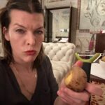 Milla Jovovich Instagram - Happy New Year from the Andersons! This post goes back in time of our epic New Year’s Day. It starts with a hard won family photo where almost everyone is in focus.  Before that I made dinner in our hotel using a one burner hot plate (half the food was pretty lukewarm but still delicious). I made my mom’s famous fried potatoes which is always a hit with the kids, but also some gorgeous asparagus and trumpet mushrooms fresh from the farmers market here in Krakow. I even have my super Eastern European wire rack where I keep the veggies☺️. And of course this morning started with an epic New Years trip to the laundromat which though not very glamorous, was extremely necessary😂. I’m sending so much love to everyone and I hope this New Year brings us all health, love and patience for ourselves and others. Ok, it’s time to put the baby down. Have an amazing night everyone!🍾🎆🎊🎉🎈xo m❤️