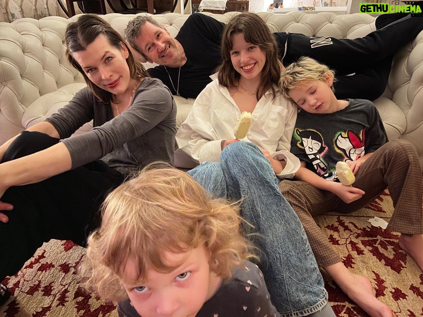 Milla Jovovich Instagram - Happy New Year from the Andersons! This post goes back in time of our epic New Year’s Day. It starts with a hard won family photo where almost everyone is in focus. Before that I made dinner in our hotel using a one burner hot plate (half the food was pretty lukewarm but still delicious). I made my mom’s famous fried potatoes which is always a hit with the kids, but also some gorgeous asparagus and trumpet mushrooms fresh from the farmers market here in Krakow. I even have my super Eastern European wire rack where I keep the veggies☺️. And of course this morning started with an epic New Years trip to the laundromat which though not very glamorous, was extremely necessary😂. I’m sending so much love to everyone and I hope this New Year brings us all health, love and patience for ourselves and others. Ok, it’s time to put the baby down. Have an amazing night everyone!🍾🎆🎊🎉🎈xo m❤️