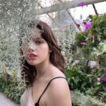 Milla Jovovich Instagram – Never thought a trip to the botanical gardens would make the kids so peaceful and introspective. We all wandered through the humid environment and the little ones would sit so still waiting for the fairies to come out of hiding. The girls watched the reflections of the plants and leaves in the pools of water, speaking in whispers. I took the opportunity to snap some beautiful, poignant pictures that I knew captured the mood we all felt. Some places have magic. You can feel them. Kids feel them even stronger and react in unexpected ways. My own who are usually chatterboxes just perched in out of the way places and let the garden speak to them in its warm, languorous, embracing way. And it all felt exactly as it should. And it all felt just right.  Xo m❤️