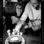 Poppy Delevingne Instagram - A year ago today we lost you, & not a day goes by where I don’t think about you, our beloved Granny… with that significant hair, lashes to rival Hepburn & an undeniable sparkle. I miss her. I miss the way she’d tell me off for cutting cheese “the wrong way”. I miss her teeny tiny pots that she’d keep around the house, too small to fit anything in… Granny loved crumpets, & butter on EVERYTHING, & her garden. Her garden was her world ~ her happy place… that’s where I like to think of her now. Drenched in dew, wellies on, laughing at the sun. 💛