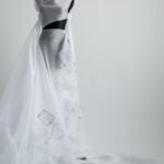 Milla Jovovich Instagram - Today marks the one year anniversary of the war on Ukraine. I am working with exceptional Ukrainian designer @lever_couture who is taking “love letters” for Ukraine and sewing them by hand on a couture gown which will be auctioned off with all proceeds going to @zelenskafoundation.  Here are some pics of the amazing process of making this one of a kind gown! My letter was written as a poem which you can read below:

My motherland cries tears of smoke and ashes
Her men fight with the ingenuity of true belief
So many hearts, so many women torn in pieces
Of husbands, children, cats and curtains, blown out flats
Windows, plates and tea cups, ethics and ideals bombarded by the sounds of missiles landing at the door
The bodies of their men, forced to become hero’s
Whether they wanted to or not 
Their scent, their touch, their familiar voices Whispering words of desperate comfort and of everlasting love
Ripped away, maybe for now, maybe forever
I love you…
Whispered fiercely into a beloved ear
I love you whispered fiercely into the wind 
As the gunfire and the blood drenches Everything and all
I love you Ukraina. 
I love you as my ears explode 
#waronukraine