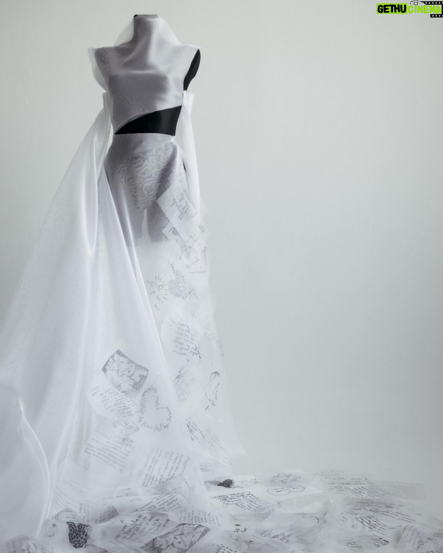 Milla Jovovich Instagram - Today marks the one year anniversary of the war on Ukraine. I am working with exceptional Ukrainian designer @lever_couture who is taking “love letters” for Ukraine and sewing them by hand on a couture gown which will be auctioned off with all proceeds going to @zelenskafoundation. Here are some pics of the amazing process of making this one of a kind gown! My letter was written as a poem which you can read below:
My motherland cries tears of smoke and ashes
Her men fight with the ingenuity of true belief
So many hearts, so many women torn in pieces
Of husbands, children, cats and curtains, blown out flats
Windows, plates and tea cups, ethics and ideals bombarded by the sounds of missiles landing at the door
The bodies of their men, forced to become hero’s
Whether they wanted to or not
Their scent, their touch, their familiar voices Whispering words of desperate comfort and of everlasting love
Ripped away, maybe for now, maybe forever
I love you…
Whispered fiercely into a beloved ear
I love you whispered fiercely into the wind
As the gunfire and the blood drenches Everything and all
I love you Ukraina.
I love you as my ears explode
#waronukraine