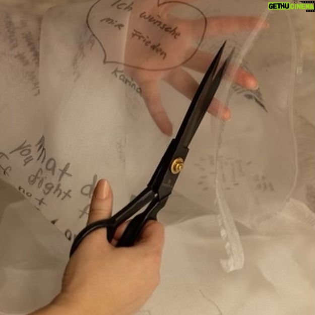Milla Jovovich Instagram - Today marks the one year anniversary of the war on Ukraine. I am working with exceptional Ukrainian designer @lever_couture who is taking “love letters” for Ukraine and sewing them by hand on a couture gown which will be auctioned off with all proceeds going to @zelenskafoundation. Here are some pics of the amazing process of making this one of a kind gown! My letter was written as a poem which you can read below:
My motherland cries tears of smoke and ashes
Her men fight with the ingenuity of true belief
So many hearts, so many women torn in pieces
Of husbands, children, cats and curtains, blown out flats
Windows, plates and tea cups, ethics and ideals bombarded by the sounds of missiles landing at the door
The bodies of their men, forced to become hero’s
Whether they wanted to or not
Their scent, their touch, their familiar voices Whispering words of desperate comfort and of everlasting love
Ripped away, maybe for now, maybe forever
I love you…
Whispered fiercely into a beloved ear
I love you whispered fiercely into the wind
As the gunfire and the blood drenches Everything and all
I love you Ukraina.
I love you as my ears explode
#waronukraine