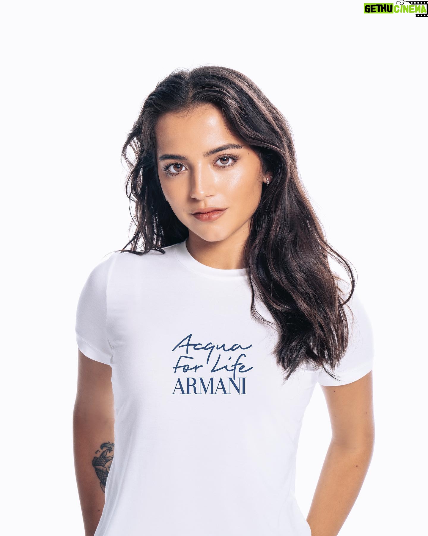 Isabela Merced Instagram - Today is World Water Day. Women and girls around the world spend a collective 200 million hours a day collecting water, a duty that deprives them to work or go to school. Because everything begins with water, @armanibeauty’s ACQUA FOR LIFE initiative has been a source of clean water for 590,000 people, in 23 countries and aims to be a source for 1 million people by 2030. Be a source too, check Acqua for Life on armanibeauty.com #armanibeauty #AcquaforLife